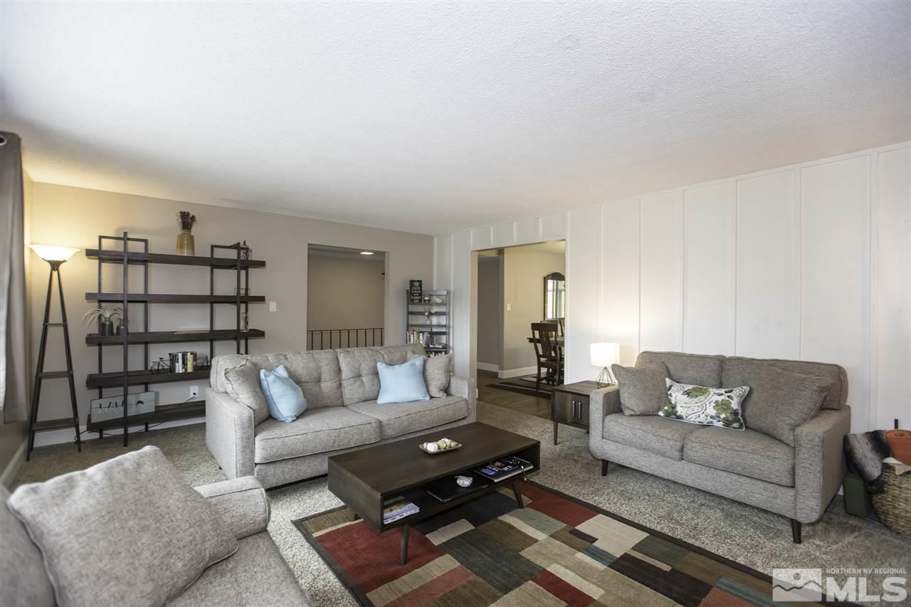 1055 Mark Allen Circle Reno, NV 89503 - Photo 5 of 27 a living room with furniture and a couch