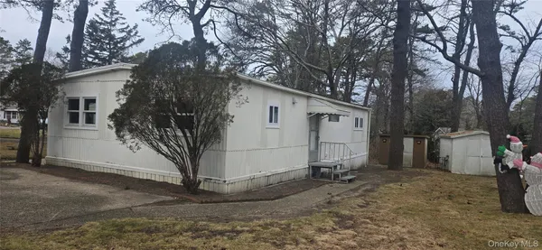a view of a barn in the row yard