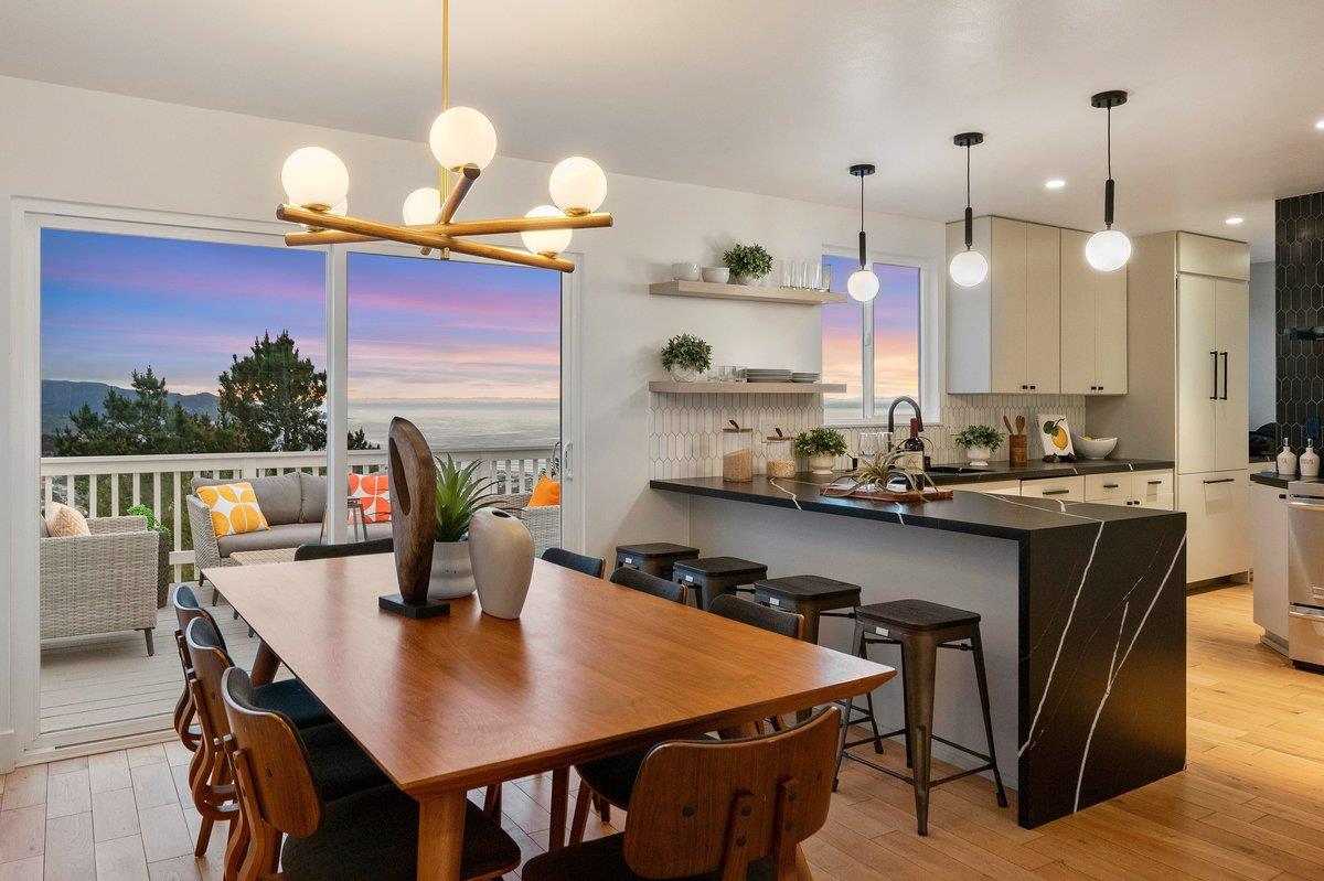 170 Beachview Avenue Pacifica, CA 94044 - Photo 16 of 85 a kitchen with a dining table cabinets and a counter top space
