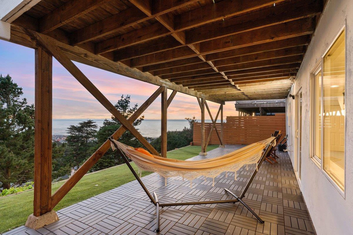 170 Beachview Avenue Pacifica, CA 94044 - Photo 26 of 85 a view of sitting area in balcony with wooden floor