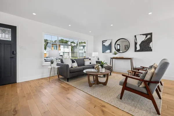a kitchen with a table and chairs