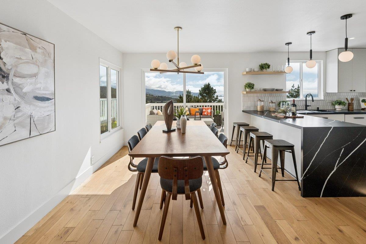 170 Beachview Avenue Pacifica, CA 94044 - Photo 39 of 85 a view of a dining room with furniture window and wooden floor