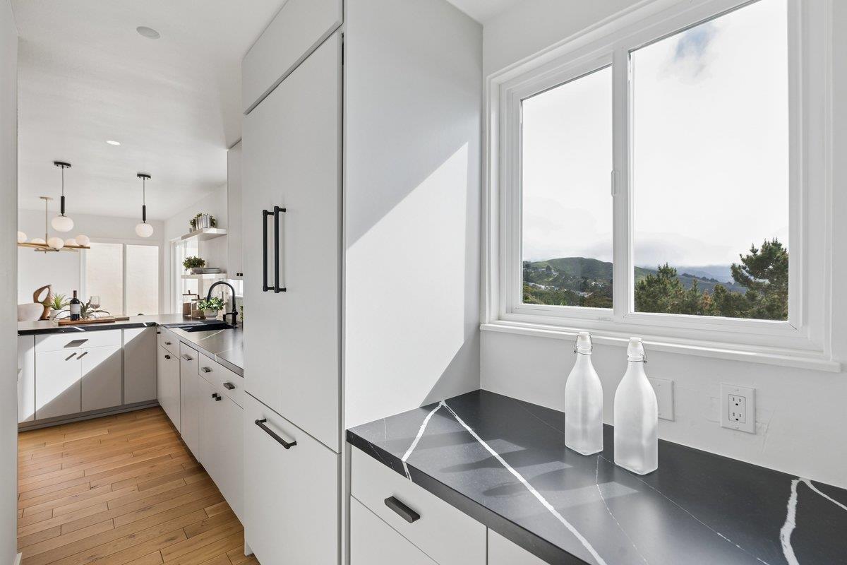 170 Beachview Avenue Pacifica, CA 94044 - Photo 51 of 85 a kitchen with a sink and white cabinets