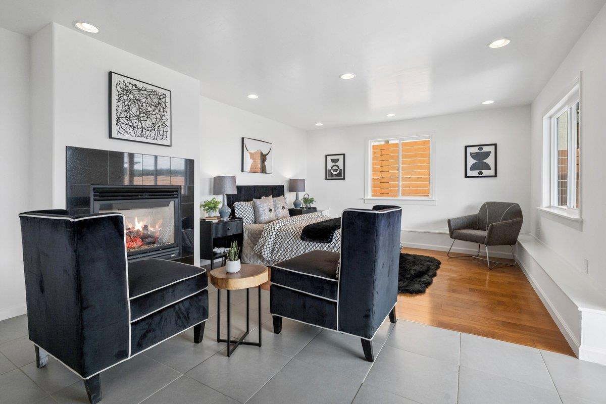 170 Beachview Avenue Pacifica, CA 94044 - Photo 62 of 85 a bed room with furniture and a flat screen tv