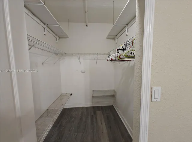a view of a walk in closet