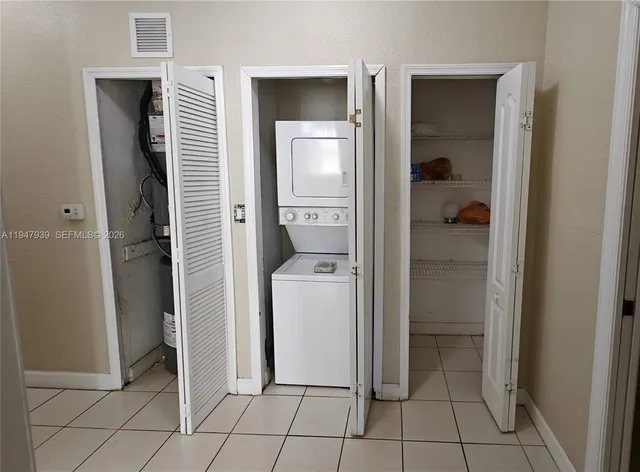 a room view with a bathroom