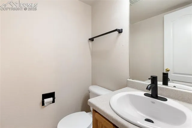 a bathroom with a sink and a toilet