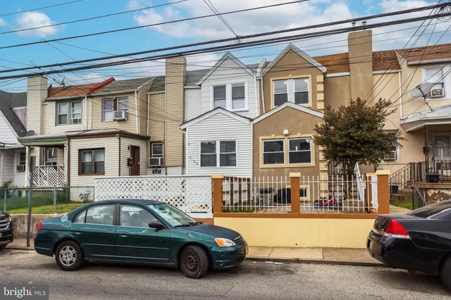 a car parked in front of a house