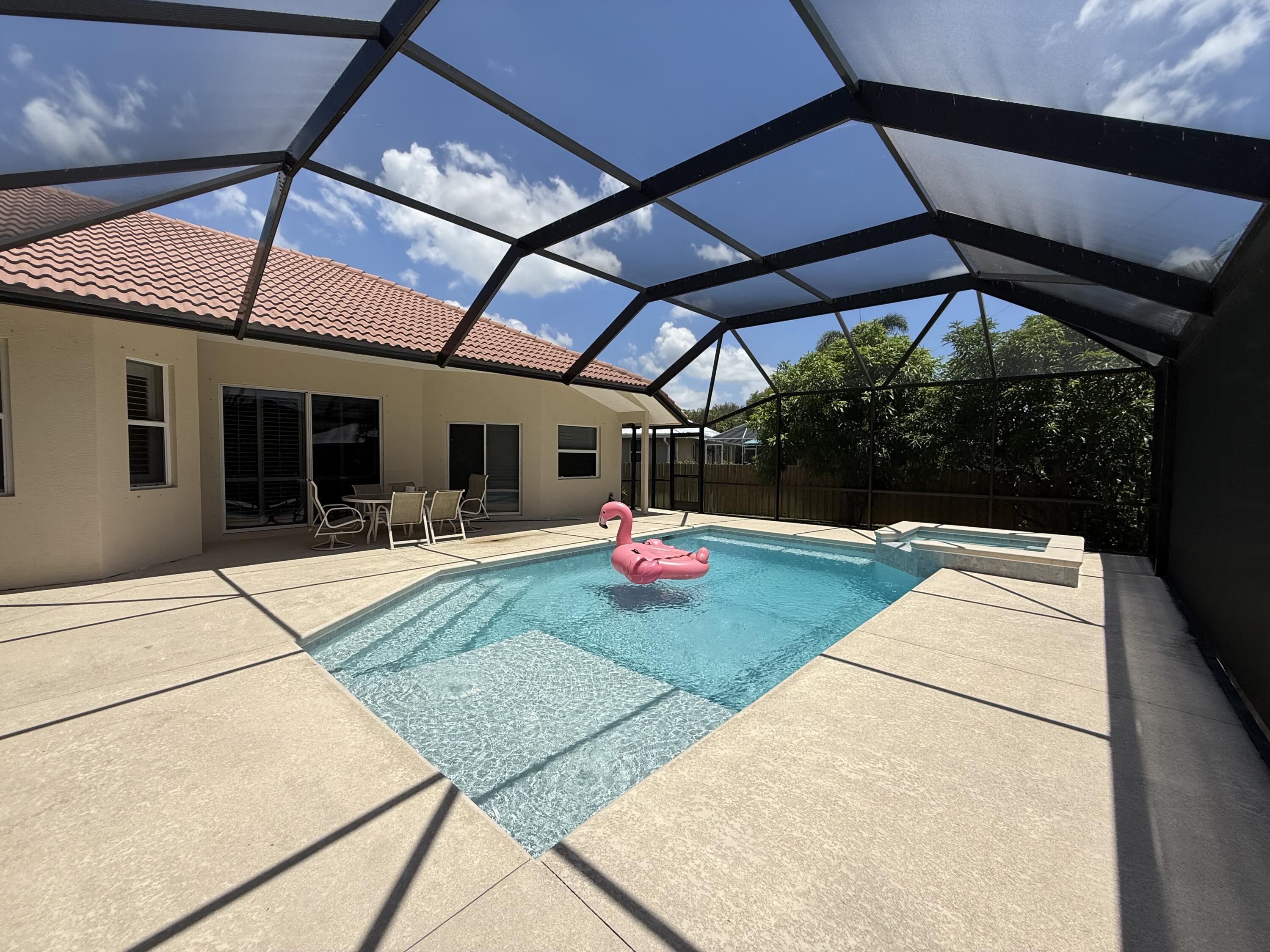 2810 Southeast Tate Avenue Port St. Lucie, FL 34984 - Photo 12 of 43 a view of a backyard