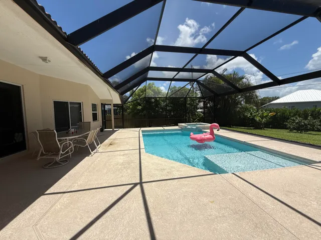a view of yard with a patio