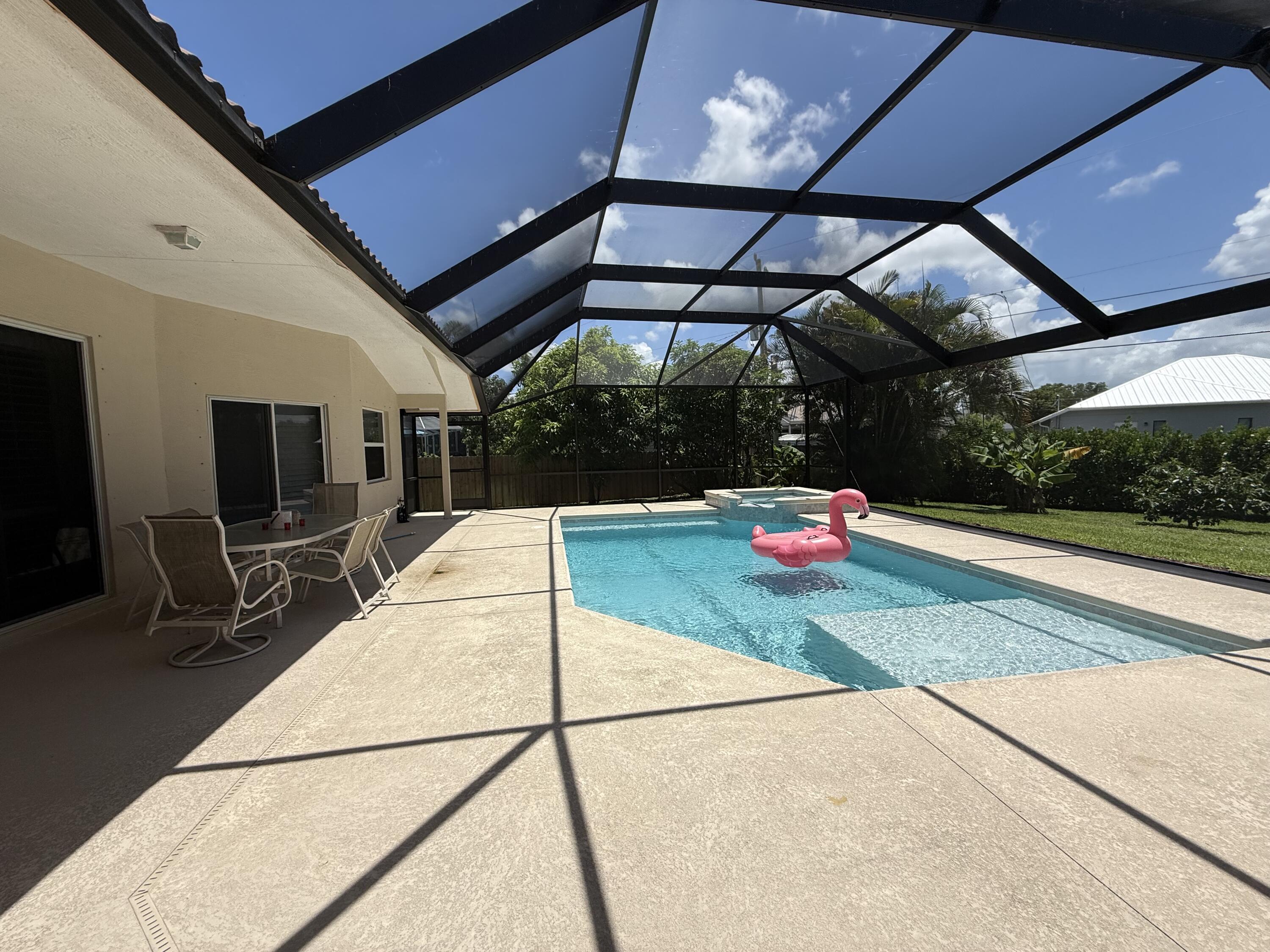 2810 Southeast Tate Avenue Port St. Lucie, FL 34984 - Photo 17 of 43 a view of yard with a patio