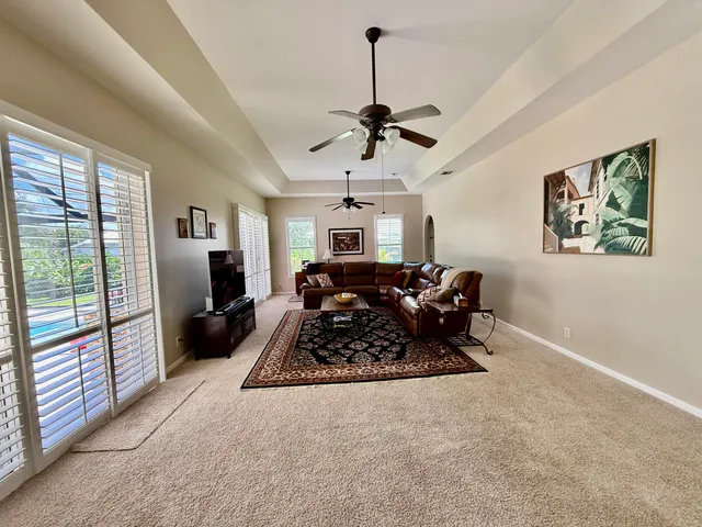 a bed room with furniture and a window