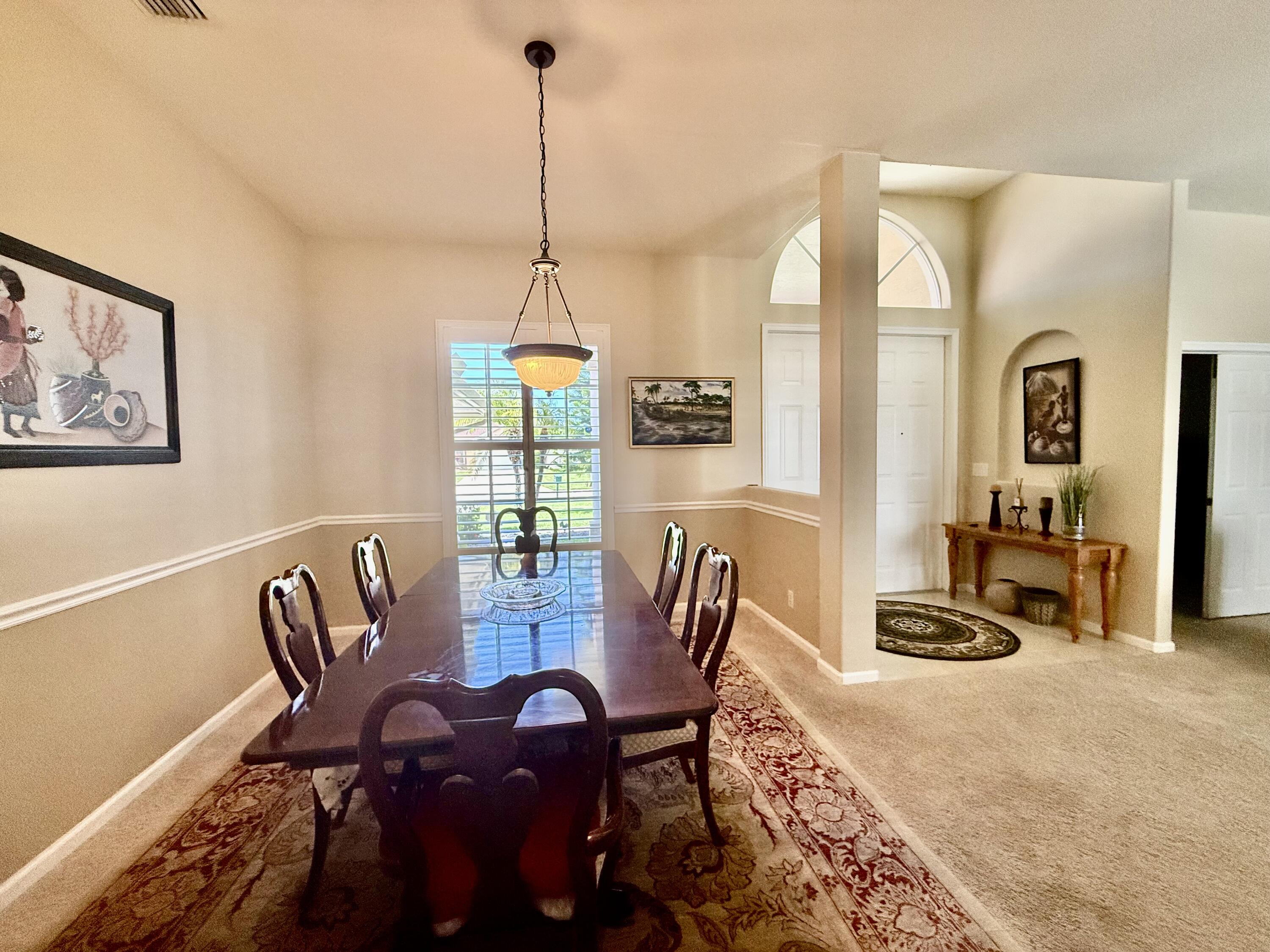 2810 Southeast Tate Avenue Port St. Lucie, FL 34984 - Photo 4 of 43 a view of a dining room with furniture