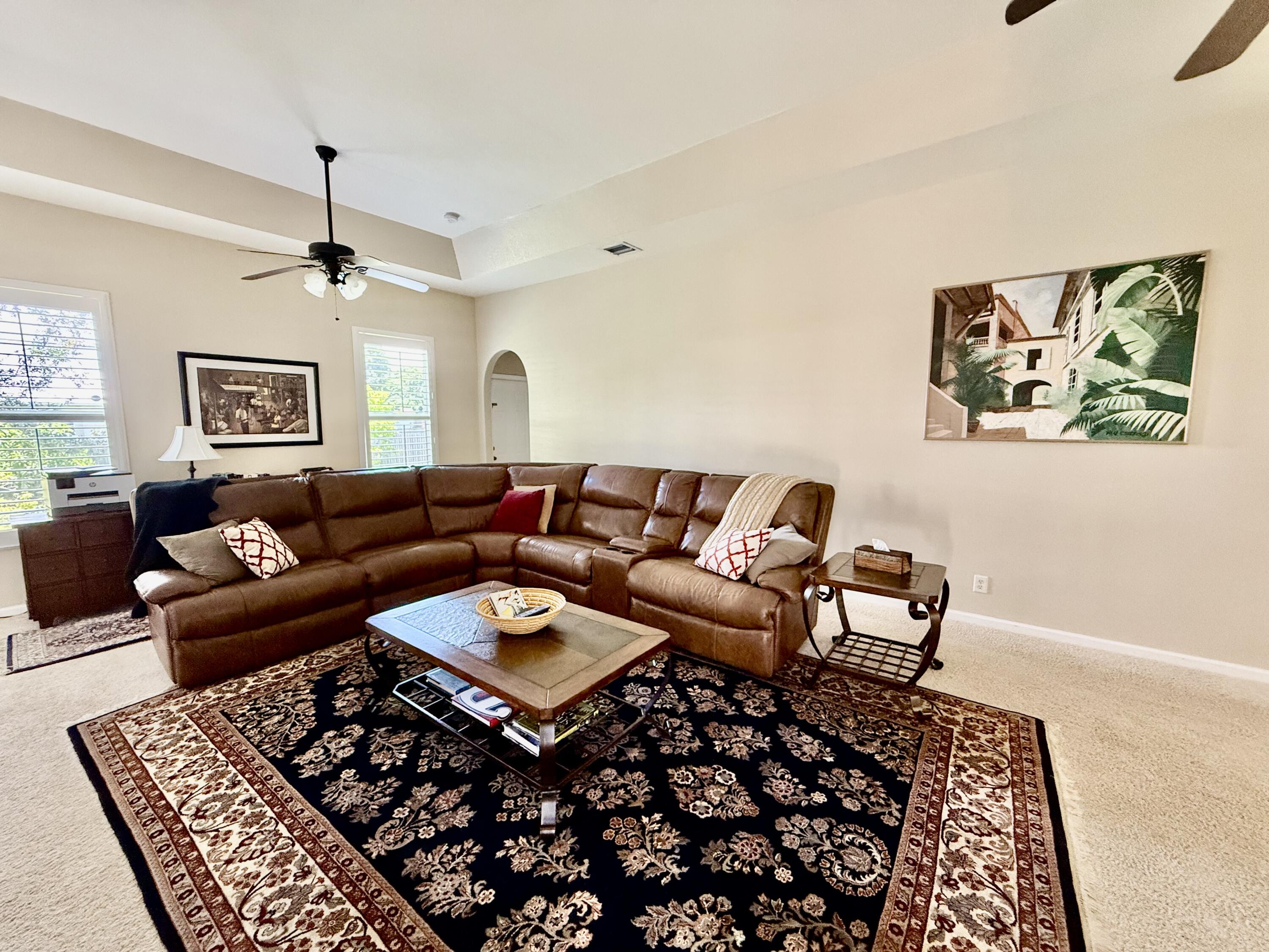 2810 Southeast Tate Avenue Port St. Lucie, FL 34984 - Photo 9 of 43 a living room with furniture and a rug