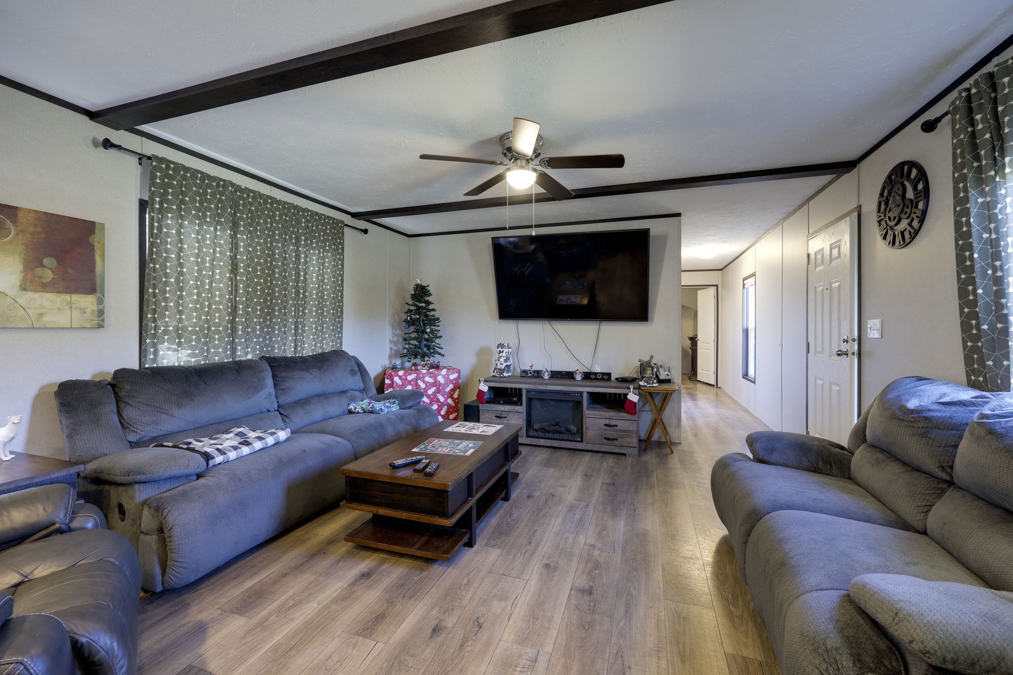 474 Hiwassee Road Lebanon, TN 37087 - Photo 6 of 25 a living room with furniture a flat screen tv and a large window