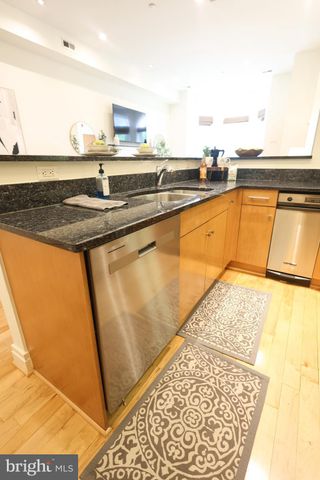 a view of a kitchen with kitchen island and a window