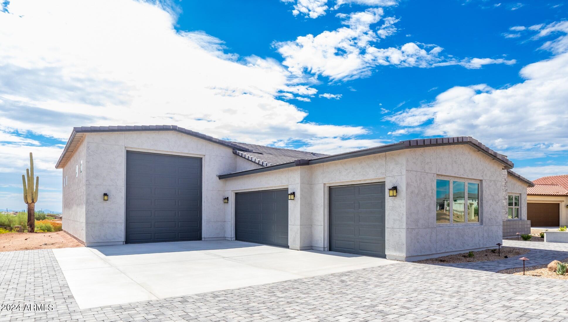 522 North Sun Road Apache Junction, AZ 85119 - Photo 1 of 46 a view of a house with a patio
