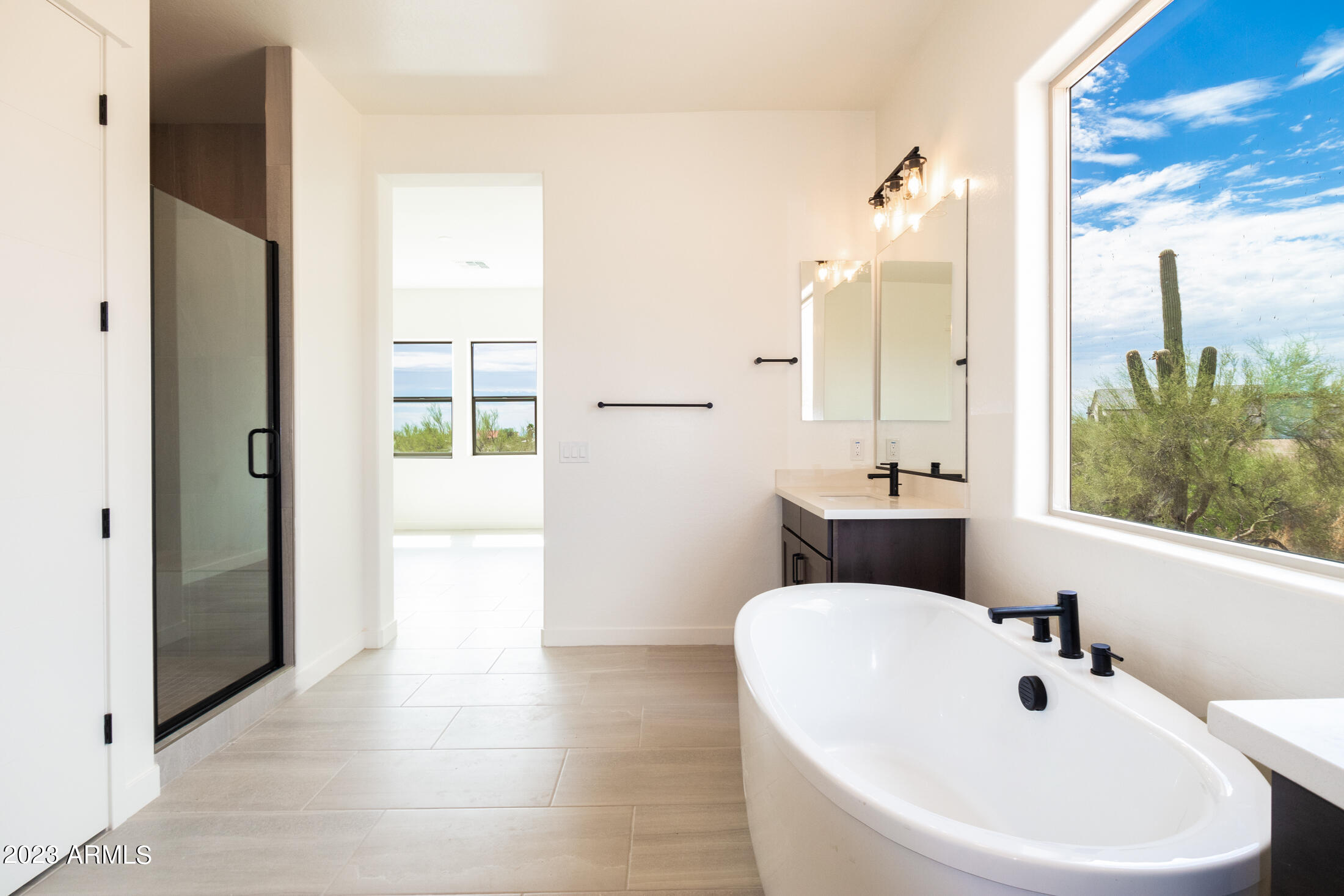522 North Sun Road Apache Junction, AZ 85119 - Photo 40 of 46 a bathroom with a sink and a mirror