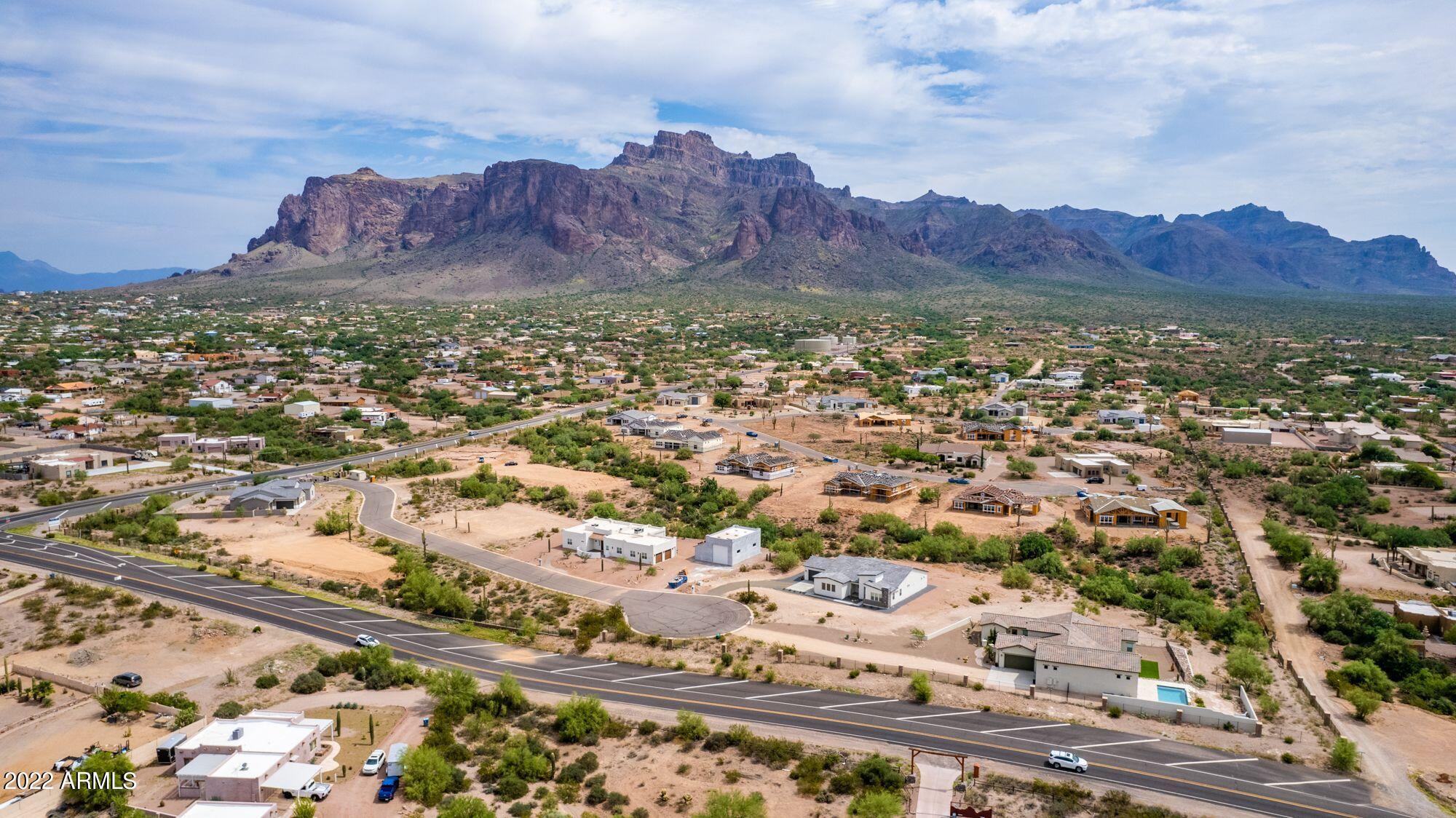 522 North Sun Road Apache Junction, AZ 85119 - Photo 9 of 46 an aerial view of residential house and sandy dunes