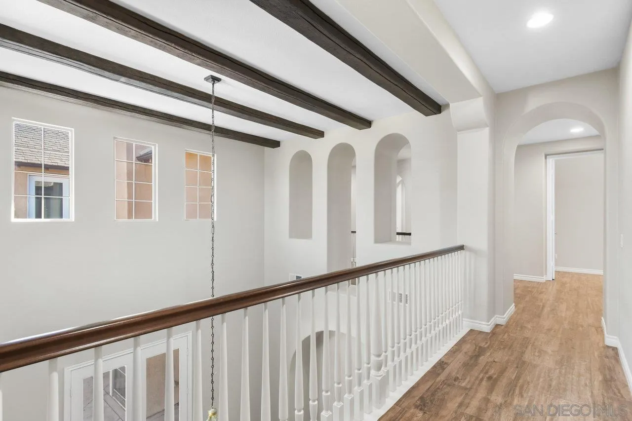 2957 Ranch Gate Road Chula Vista, CA 91914 - Photo 34 of 75 a view of staircase with white walls and a window