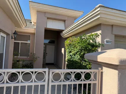 a view of a house with a sink and a table and chair