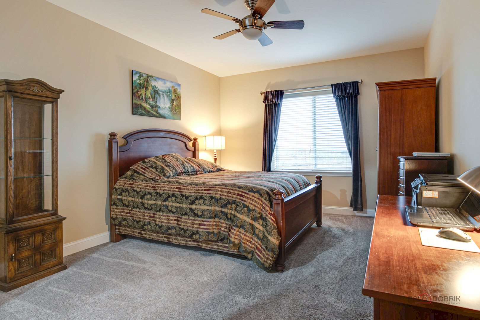 125 North Buffalo Grove Road, Unit 306 Buffalo Grove, IL 60089 - Photo 13 of 19 a bedroom with a bed next to a window