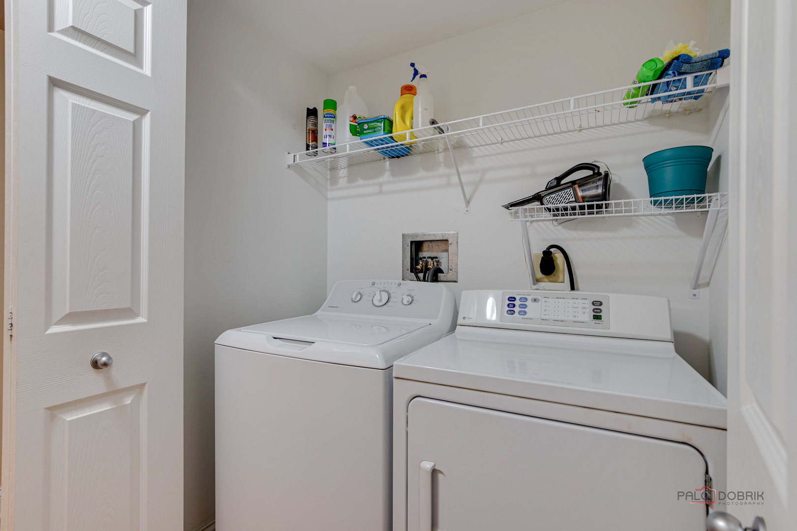 125 North Buffalo Grove Road, Unit 306 Buffalo Grove, IL 60089 - Photo 17 of 19 a utility room with dryer and washer