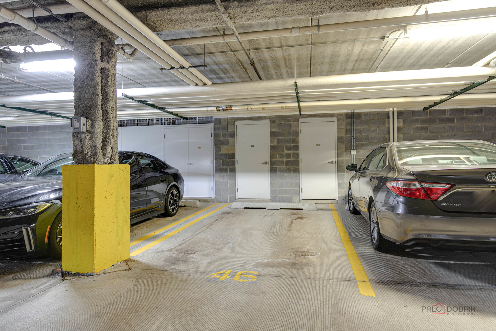 125 North Buffalo Grove Road, Unit 306 Buffalo Grove, IL 60089 - Photo 19 of 19 a view of a garage with car parked