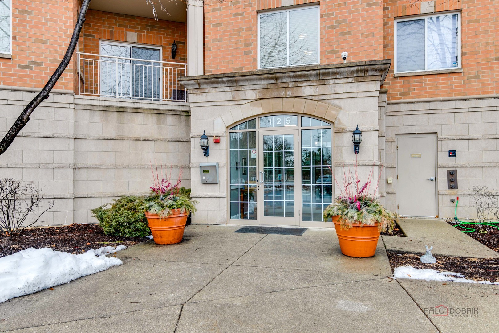 125 North Buffalo Grove Road, Unit 306 Buffalo Grove, IL 60089 - Photo 2 of 19 a front view of a building