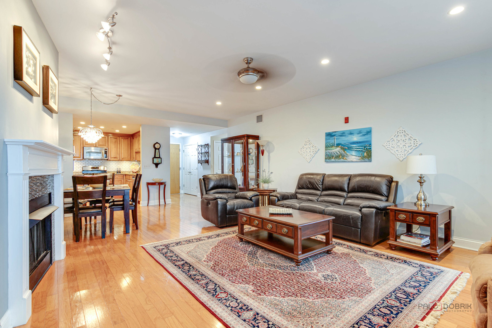 125 North Buffalo Grove Road, Unit 306 Buffalo Grove, IL 60089 - Photo 7 of 19 a living room with furniture and a table