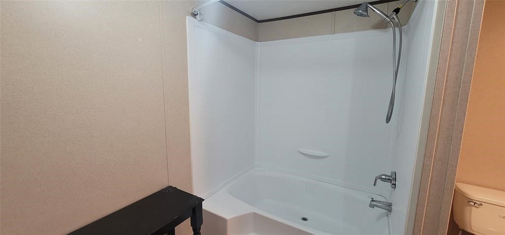 28625 Clay Road, Unit C Katy, TX 77493 - Photo 13 of 18 a bathroom with a bathtub