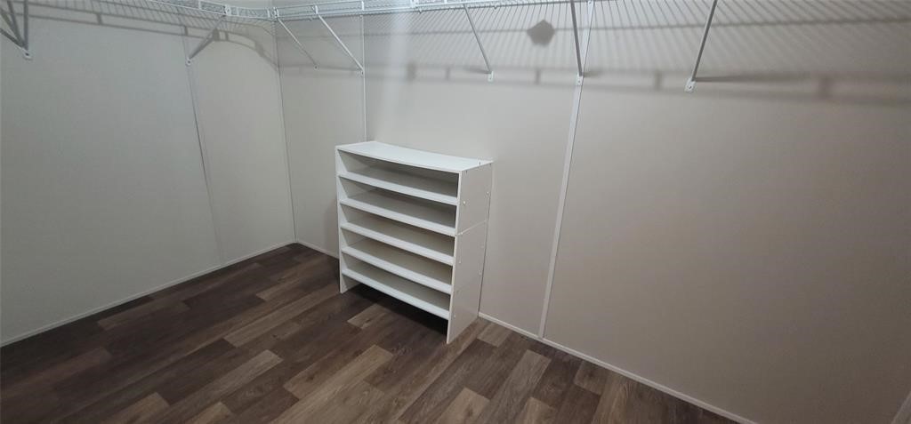 28625 Clay Road, Unit C Katy, TX 77493 - Photo 14 of 18 a view of room with stairs and a window