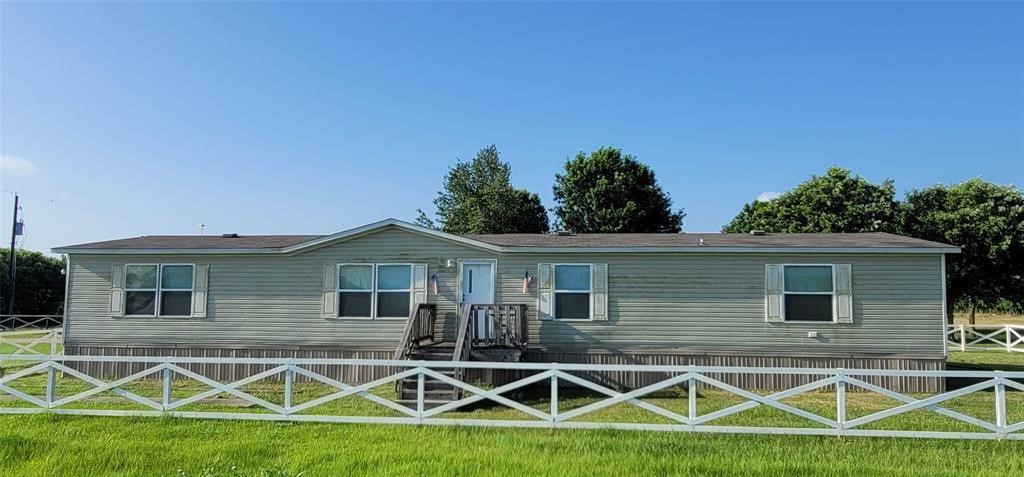 28625 Clay Road, Unit C Katy, TX 77493 - Photo 2 of 18 a backyard of a house with table and chairs
