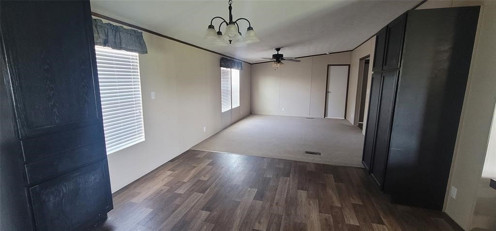 28625 Clay Road, Unit C Katy, TX 77493 - Photo 6 of 18 a view of a hallway with wooden floor and staircase