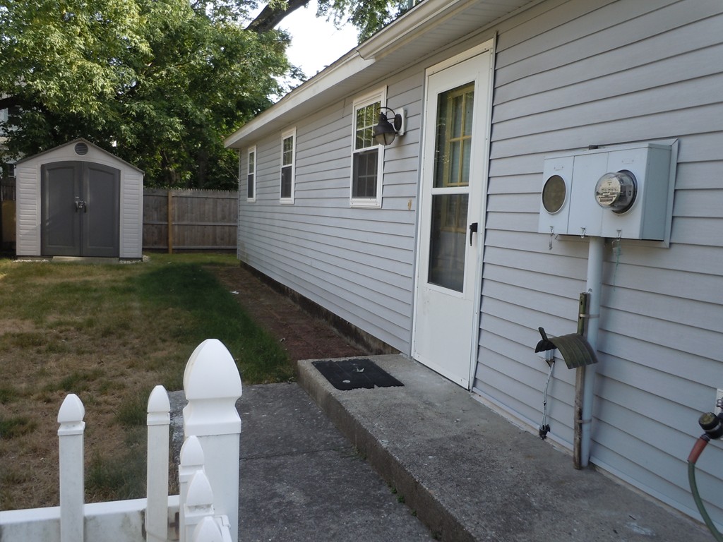41 Blodgett Street Springfield, MA 01108 - Photo 21 of 23 a house view with a backyard space