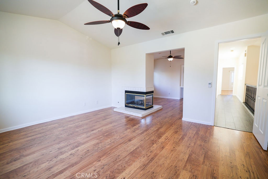 19530 Chinotto Lane Riverside, CA 92508 - Photo 22 of 50 Fireplace in Primary Bedroom with Vaulted Ceilings