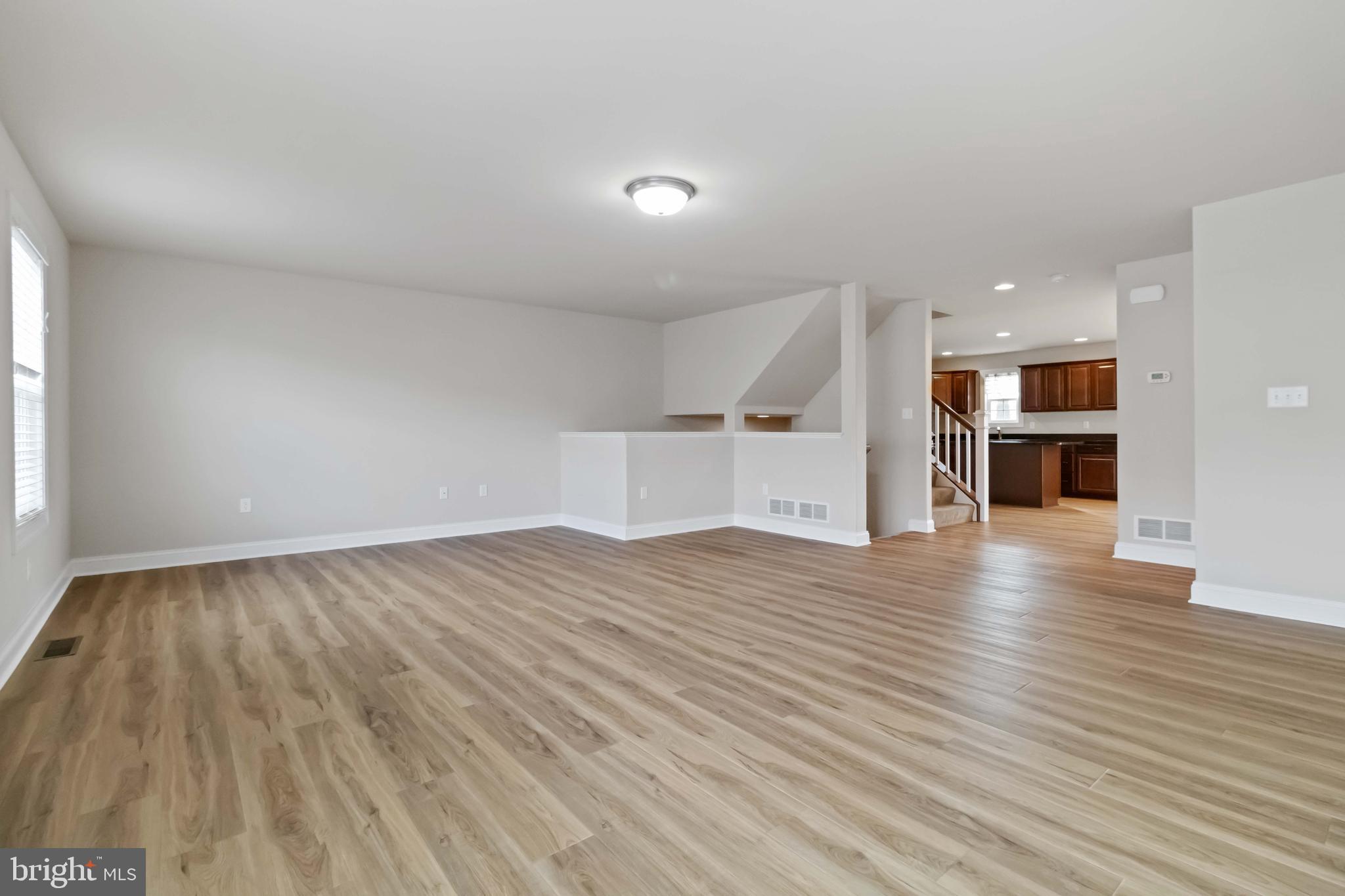 813 Spring Rock Court Mechanicsburg, PA 17055 - Photo 7 of 31 Great Room 23' 2" x 17'8"