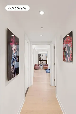 a view of a livingroom with furniture and a flat screen tv