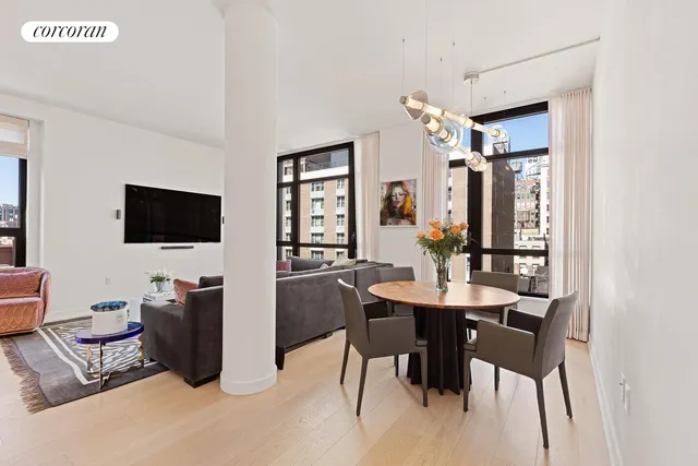 a view of a livingroom with furniture and window