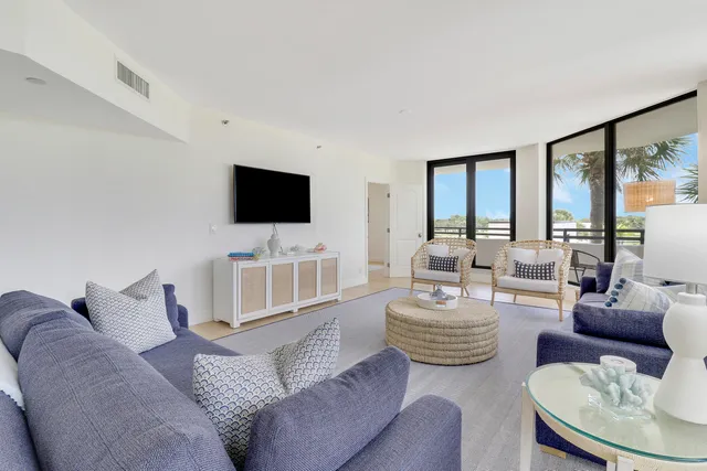 a spacious bathroom with a double vanity sink and a window