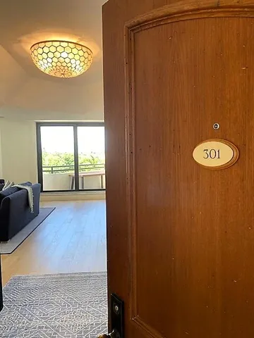 a view of a livingroom with furniture and wooden floor