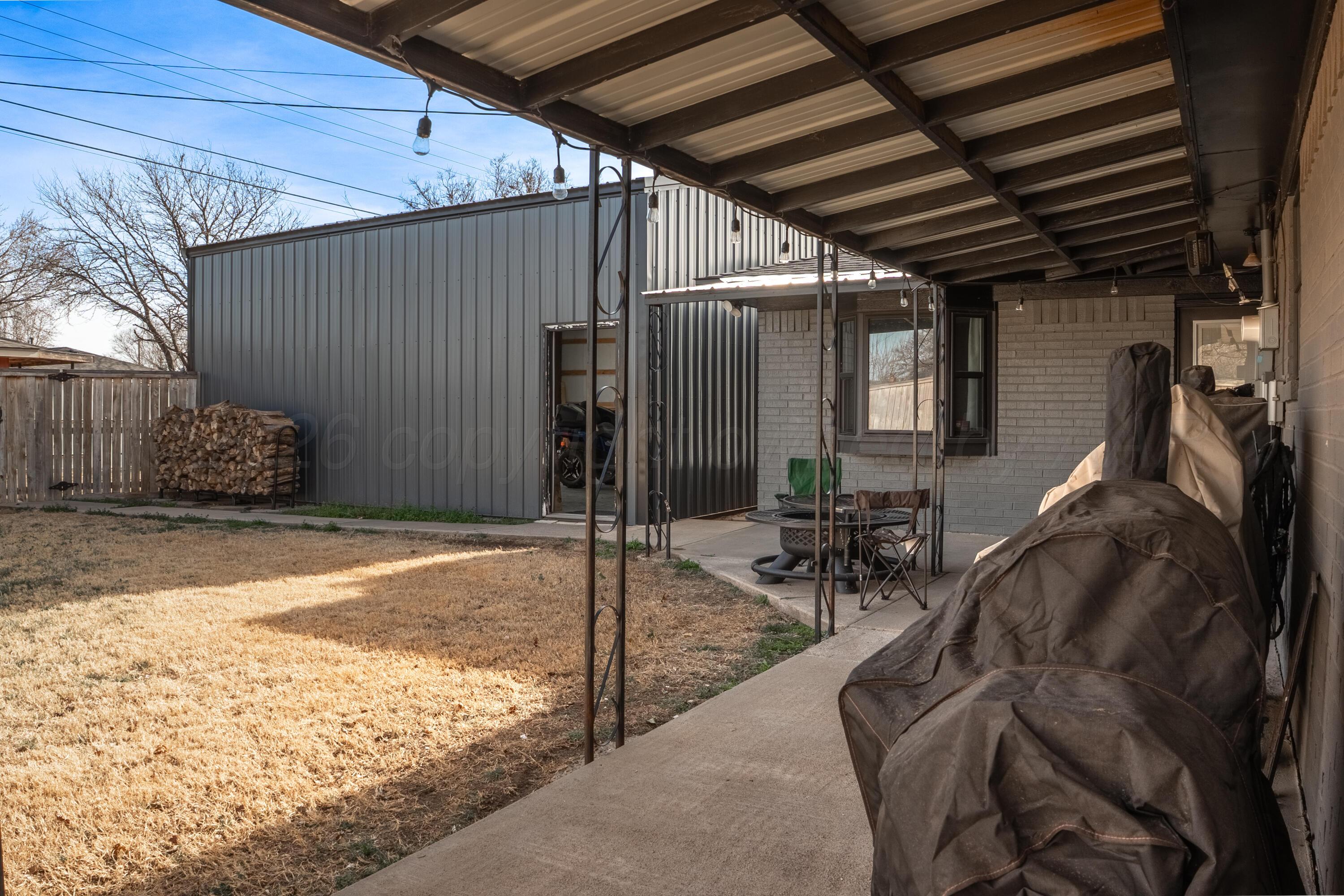 415 Mustang Street Fritch, TX 79036 - Photo 20 of 23 a view of a porch