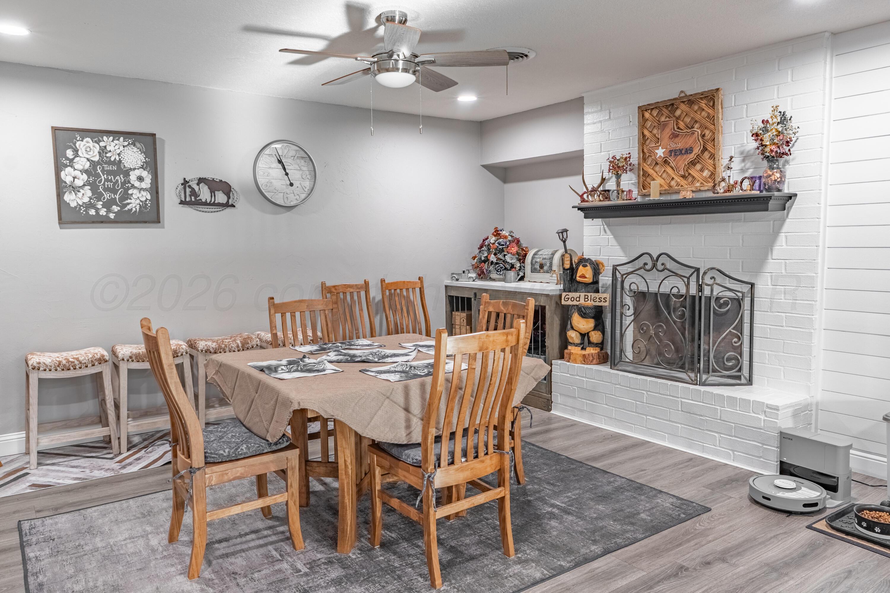 415 Mustang Street Fritch, TX 79036 - Photo 10 of 23 a dining room with furniture and window