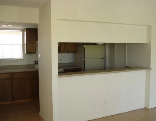 a view of a bathroom with a sink and a window
