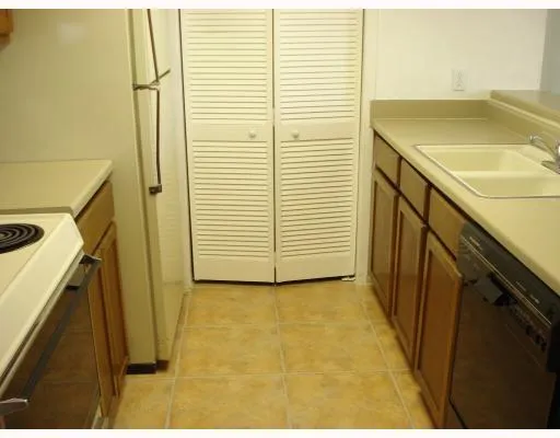 a bathroom with a sink and a window