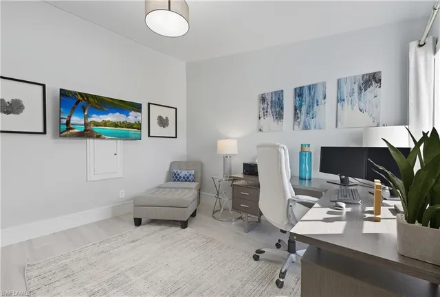 a bathroom with a double vanity sink a mirror and a toilet