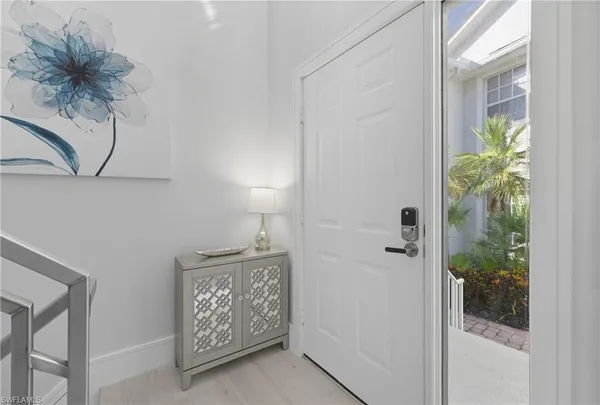 a bathroom with a shower and a sink