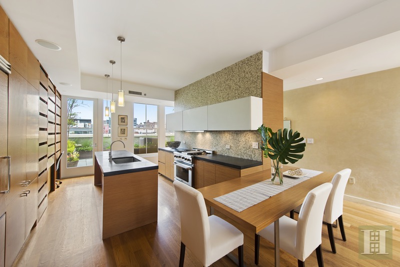 51 Walker Street, Unit PH9A Manhattan, NY 10013 - Photo 1 of 1 a kitchen with stainless steel appliances granite countertop sink stove top oven and cabinets