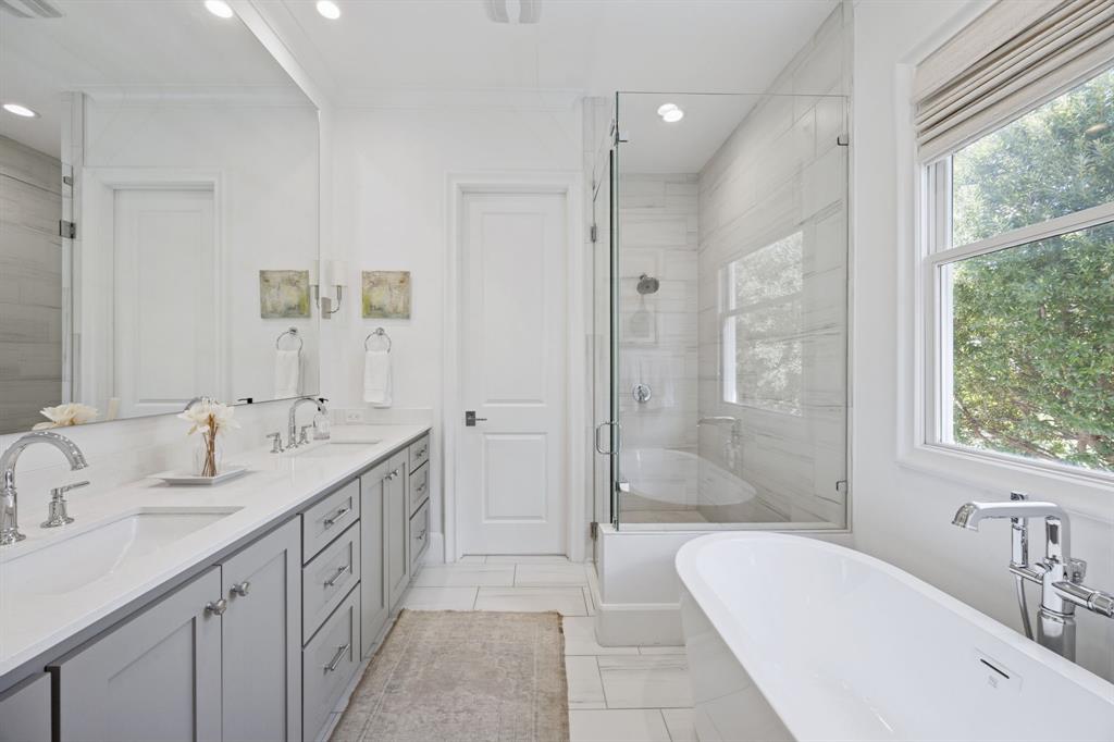 13450 Shumate Way Malakoff, TX 75148 - Photo 16 of 40 a spacious bathroom with a double vanity sink mirror double and bathtub