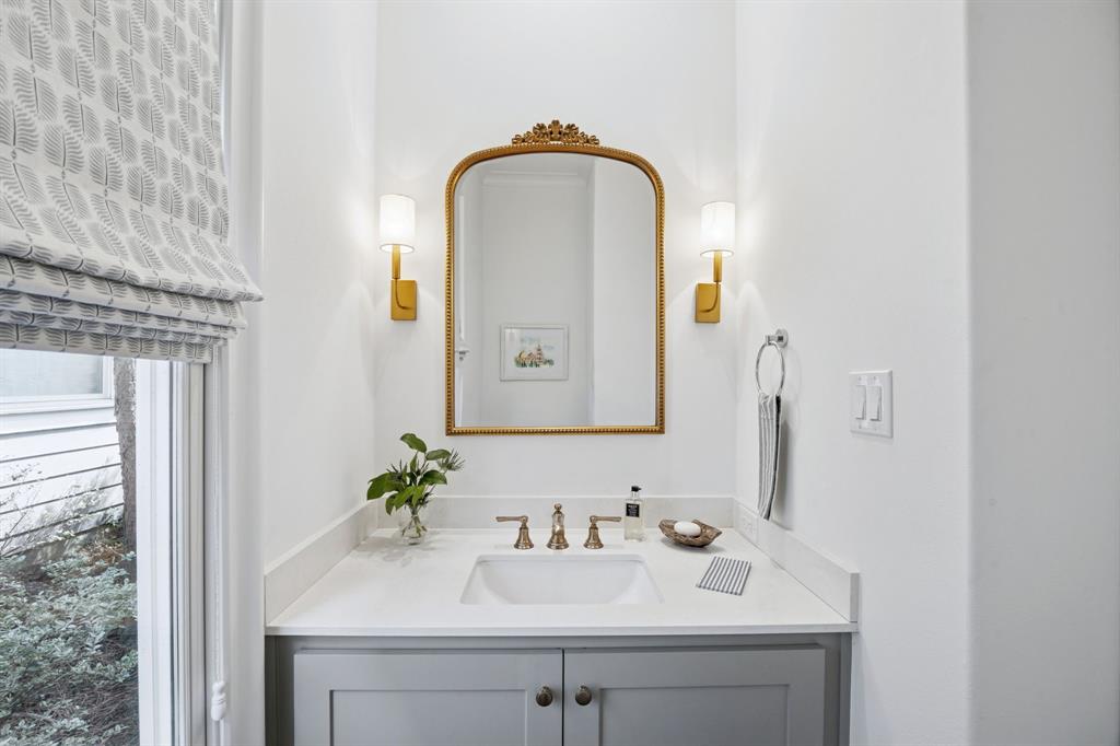 13450 Shumate Way Malakoff, TX 75148 - Photo 18 of 40 a bathroom with a sink and a mirror